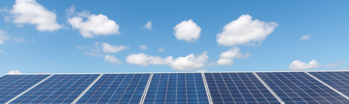 Solar panels against blue sky