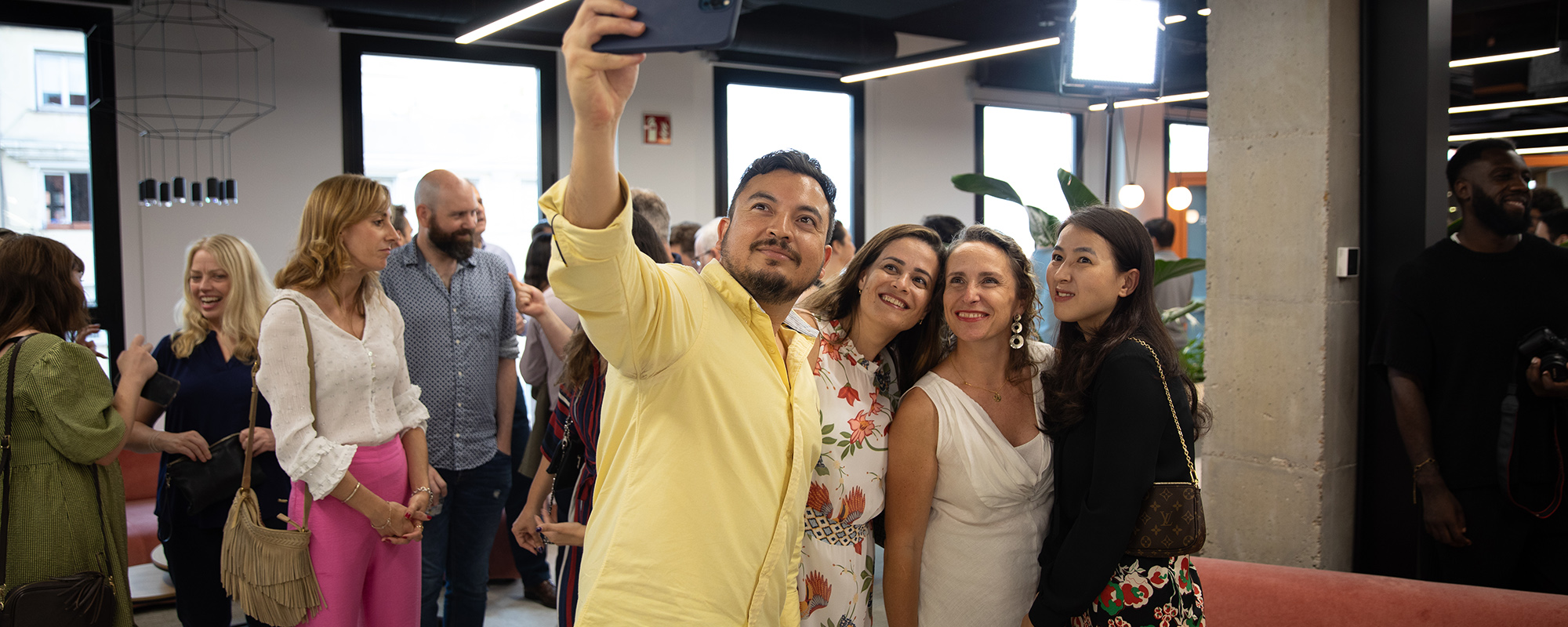 Lightsource bp team members celebrating at the Madrid office opening