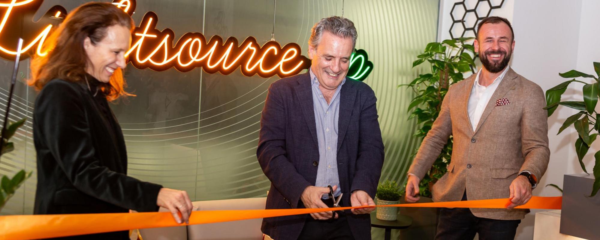 Kareen Boutonnat, Nick Boyle and Michal Glowacki cutting the ribbon at the opening of the Lightsource bp Warsaw office